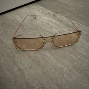 Elegant Gold-Tinted Sunglasses